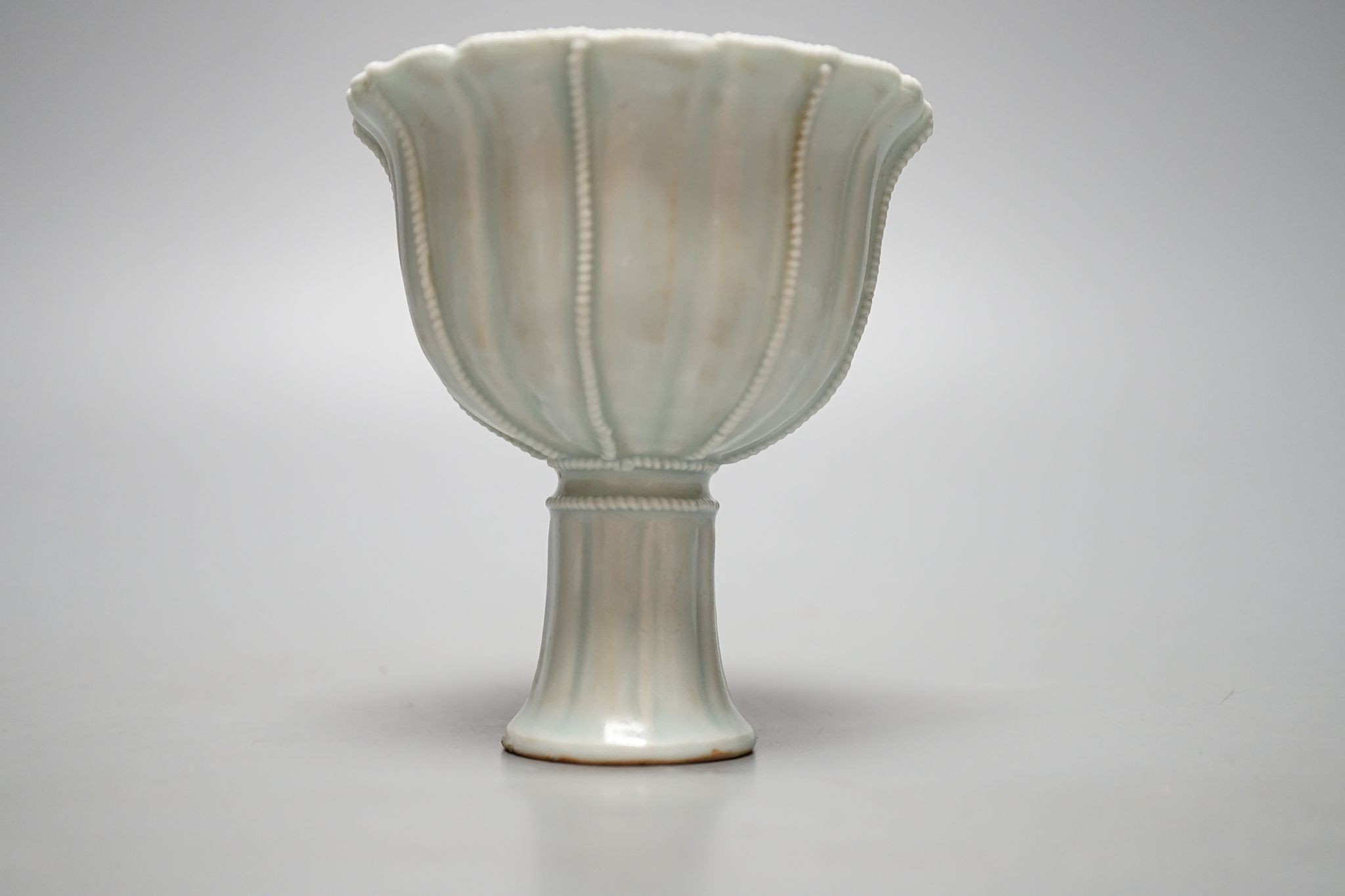A Chinese Qingbai type stem cup., 10 cms high.
